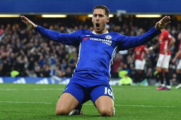 Chelsea's Belgian midfielder Eden Hazard celebrates after scoring their third goal during the English Premier League football match between Chelsea and Manchester United at Stamford Bridge in London on October 23, 2016. / AFP / Glyn KIRK / RESTRICTED TO EDITORIAL USE. No use with unauthorized audio, video, data, fixture lists, club/league logos or 'live' services. Online in-match use limited to 75 images, no video emulation. No use in betting, games or single club/league/player publications.  /         (Photo credit should read GLYN KIRK/AFP/Getty Images)