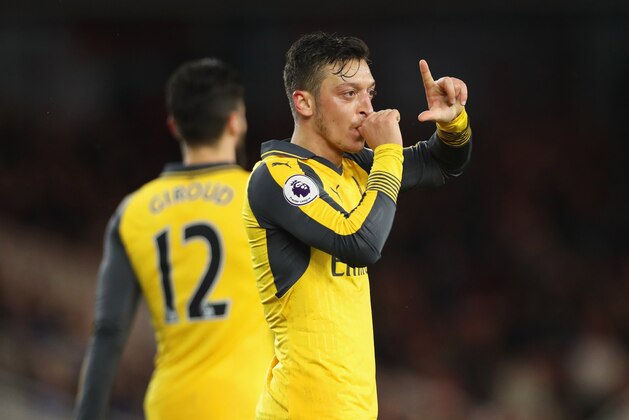 MIDDLESBROUGH, ENGLAND - APRIL 17:  Mesut Ozil of Arsenal (11) celebrates as he scores their second goal during the Premier League match between Middlesbrough and Arsenal at Riverside Stadium on April 17, 2017 in Middlesbrough, England.  (Photo by Ian MacNicol/Getty Images)