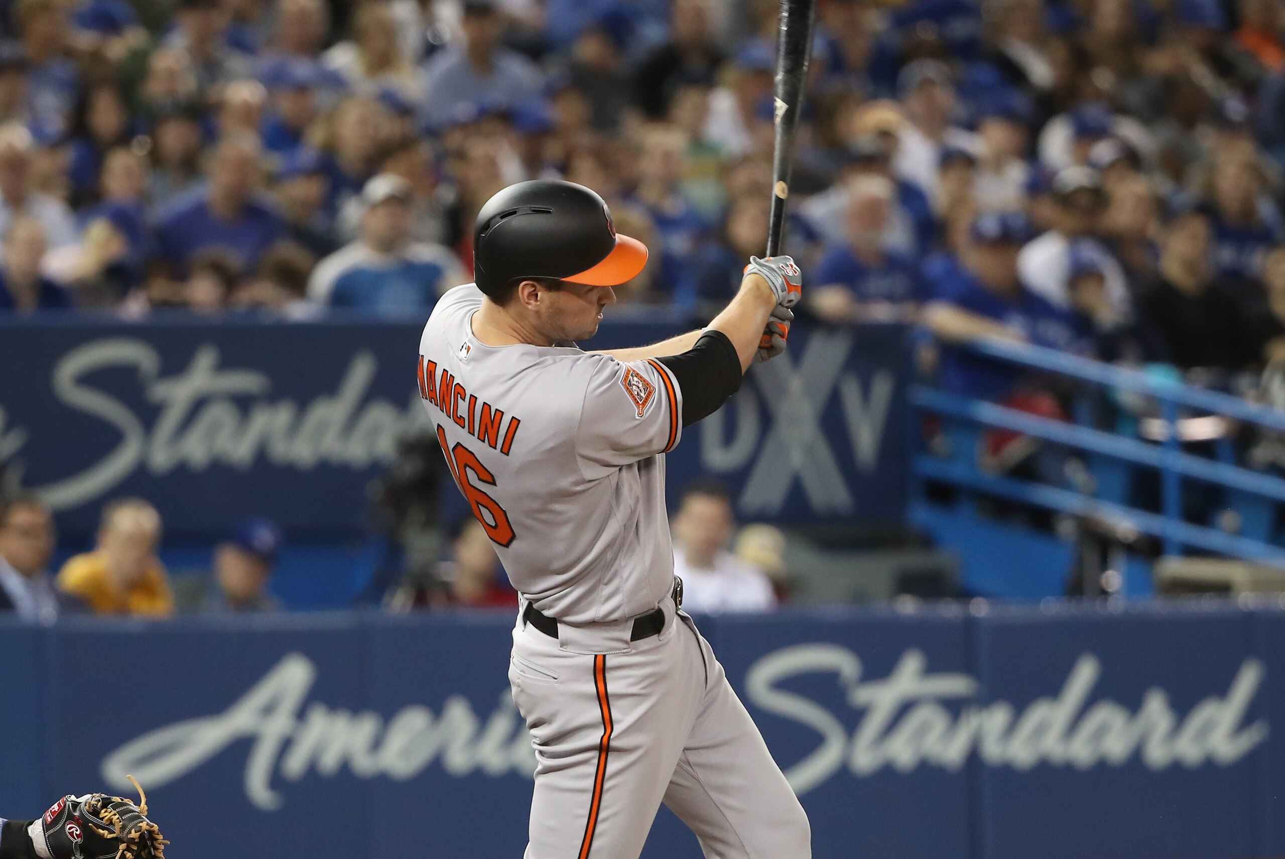 TORONTO, ON - APRIL 16: Trey Mancini #16 of the Baltimore Orioles hits a three-run home run in the sixth inning during MLB game action against the Toronto Blue Jays at Rogers Centre on April 16, 2017 in Toronto, Canada. (Photo by Tom Szczerbowski/Getty Images)