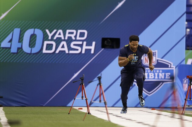 Texas A&M defensive end Myles Garrett runs a drill at the NFL football scouting combine in Indianapolis, Sunday, March 5, 2017. (AP Photo/Michael Conroy)