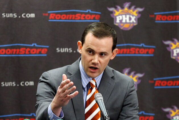 ADVANCE FOR WEEKEND EDITIONS, OCT. 26-27 - FILE- In this May 9, 2013, file photo, newly-appointed Phoenix Suns general manager Ryan McDonough speaks during an NBA basketball news conference in Phoenix. A new generation of general managers has flooded the league, and they're not the ex-players and ex-coaches that used to dominate those jobs. Six of the league’s general managers are under 40 this season. (AP Photo/Matt York, File)