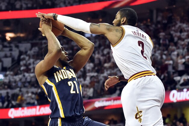 Apr 17, 2017; Cleveland, OH, USA; Cleveland Cavaliers guard Kyrie Irving (2) defends Indiana Pacers forward Thaddeus Young (21) during the first quarter in game two of the first round of the 2017 NBA Playoffs at Quicken Loans Arena. Mandatory Credit: Ken Blaze-USA TODAY Sports