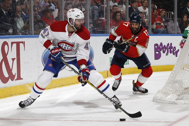 Florida Panthers center Derek MacKenzie (17) pursues Montreal Canadiens right wing Alexander Radulov (47) as he attempts to pass the puck in front of the net during the second period of an NHL hockey game, Monday, April 3, 2017, in Sunrise, Fla. The Canadiens defeated the Panthers 4-1. (AP Photo/Joel Auerbach)