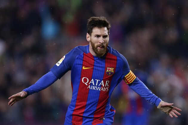 FC Barcelona's Lionel Messi celebrates after scoring during the Spanish La Liga soccer match between FC Barcelona and Real Sociedad at the Camp Nou stadium in Barcelona, Spain, Saturday, April 15, 2017. (AP Photo/Manu Fernandez)