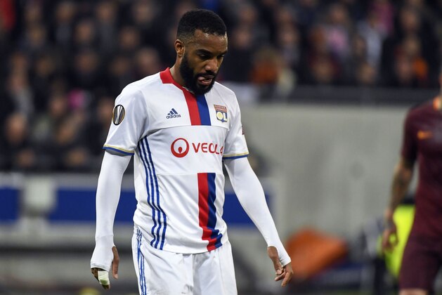 Lyon's French forward Alexandre Lacazette reacts after missing a goal opportunity during the Europa League round of 16 first leg football match between Lyon (OL) and AS Roma on March 9, 2017, at the Parc Olympique Lyonnais stadium in Decines-Charpieu, near Lyon, southeastern France. / AFP PHOTO / PHILIPPE DESMAZES        (Photo credit should read PHILIPPE DESMAZES/AFP/Getty Images)