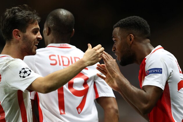 Monaco's French midfielder Thomas Lemar (R) celebrates with Monaco's Portuguese midfielder Bernardo Silva (L) after scoring during the UEFA Champions League group E football match AS Monaco and Tottenham Hotspur FC at the Louis II stadium in Monaco on November 22, 2016. / AFP / Valery HACHE        (Photo credit should read VALERY HACHE/AFP/Getty Images)