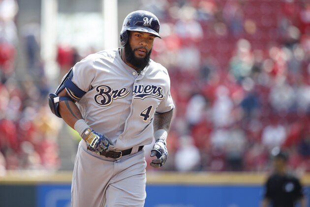CINCINNATI, OH - APRIL 15: Eric Thames #7 of the Milwaukee Brewers rounds the bases after a home run against the Cincinnati Reds during a game at Great American Ball Park on April 15, 2017 in Cincinnati, Ohio. The Reds defeated the Brewers 7-5. All players are wearing #42 in honor of Jackie Robinson Day. (Photo by Joe Robbins/Getty Images)