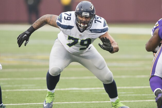 MINNEAPOLIS, MN - DECEMBER 6: Garry Gilliam #79 of the Seattle Seahawks blocks during an NFL game against the Minnesota Vikings at TCF Bank Stadium December 6, 2015 in Minneapolis, Minnesota.  (Photo by Tom Dahlin/Getty Images)