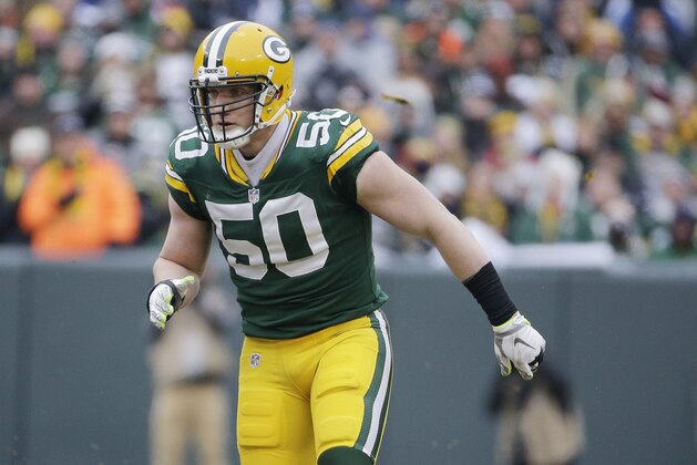 Green Bay Packers inside linebacker A.J. Hawk (50) defends against the Dallas Cowboys during the second half of an NFL divisional playoff football game Sunday, Jan. 11, 2015, in Green Bay, Wis. (AP Photo/Nam Y. Huh)