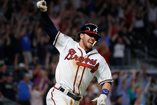 ATLANTA, GA - APRIL 17:  Dansby Swanson #7 of the Atlanta Braves reacts after hitting a walk-off single to give the Braves a 5-4 win over the San Diego Padres in the ninth inning at SunTrust Park on April 17, 2017 in Atlanta, Georgia.  (Photo by Kevin C. Cox/Getty Images)