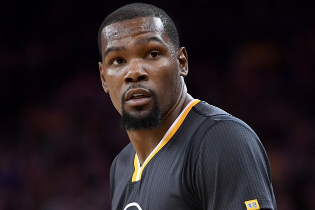 OAKLAND, CA - APRIL 08:  Kevin Durant #35 of the Golden State Warriors looks on against the New Orleans Pelicans during an NBA Basketball game at ORACLE Arena on April 8, 2017 in Oakland, California. NOTE TO USER: User expressly acknowledges and agrees that, by downloading and or using this photograph, User is consenting to the terms and conditions of the Getty Images License Agreement.  (Photo by Thearon W. Henderson/Getty Images)
