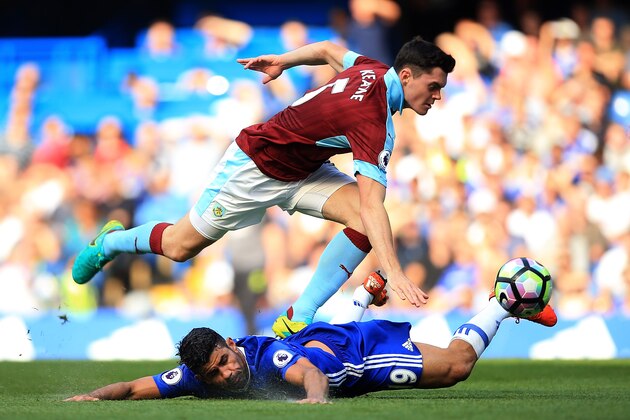 LONDON, ENGLAND - AUGUST 27:  Diego Costa of Chelsea is fouled by Michael Keane of Burnley during the Premier League match between Chelsea and Burnley at Stamford Bridge on August 27, 2016 in London, England.  (Photo by Ben Hoskins/Getty Images)