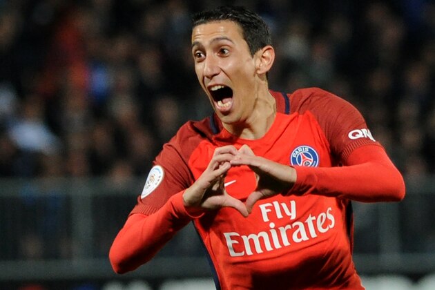 Paris Saint-Germain's Argentinian forward Angel Di Maria gestures as he celebrates with his teammates after scoring a goal during the French L1 football match between Angers and Paris Saint-Germain on April 14, 2017 at the Raymond Kopa Stadium in Angers, western France. / AFP PHOTO / FRED TANNEAU        (Photo credit should read FRED TANNEAU/AFP/Getty Images)