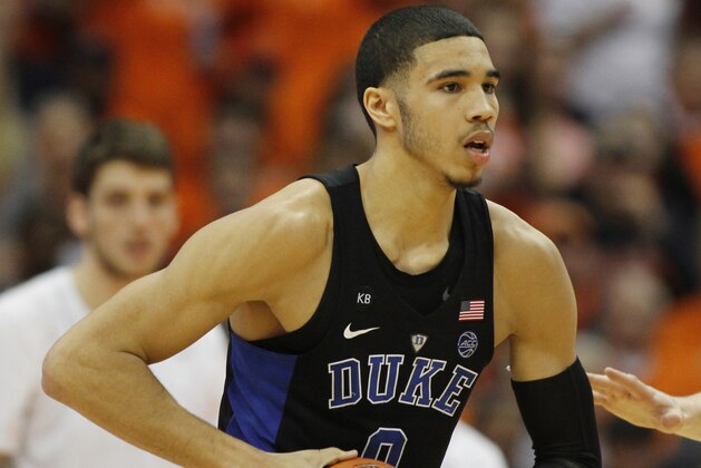 Duke's Jayson Tatum looks to pass the ball in the first half of an NCAA college basketball game against Syracuse in Syracuse, N.Y., Wednesday, Feb. 22, 2017. Syracuse won 78-75. (AP Photo/Nick Lisi)