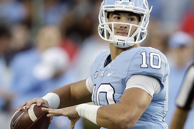 FILE - In this Nov. 19, 2016, file photo, North Carolina quarterback Mitch Trubisky (10) looks to pass against The Citadel during the first half of an NCAA college football game in Chapel Hill, N.C. Trubisky is focusing more on playing Stanford in the Sun Bowl than the NFL decision that awaits. The junior is projected as a possible first-round draft pick if he skips his final season with the Tar Heels. (AP Photo/Gerry Broome, File)