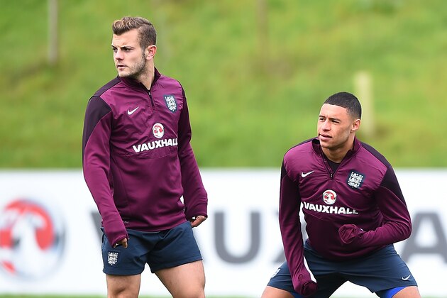 BURTON-UPON-TRENT, ENGLAND - OCTOBER 07: (L-R) Jack Wilshere, Alex Oxlade-Chamberlain and Raheem Stirling of England warm up during a training session at St Georges Park on October 7, 2014 in Burton-upon-Trent, England.  (Photo by Laurence Griffiths/Getty Images)