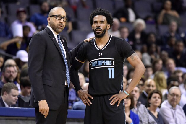 Memphis Grizzlies head coach David Fizdale talks with guard Mike Conley (11) in the second half of an NBA basketball game against the Phoenix Suns, Tuesday, Feb. 28, 2017, in Memphis, Tenn. (AP Photo/Brandon Dill)