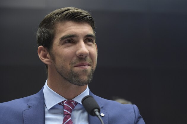 Olympic swimmer Michael Phelps testifies on Capitol Hill in Washington, Tuesday, Feb. 28, 2017, before the House Commerce Energy and Commerce subcommittee hearing on the international anti-doping system. (AP Photo/Susan Walsh)
