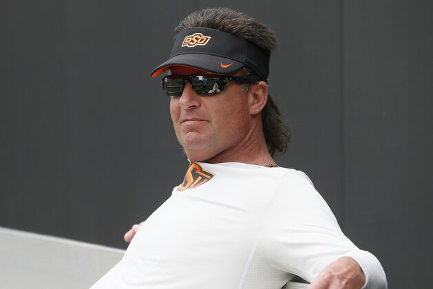 Oklahoma State head coach Mike Gundy is pictured before an intra squad spring NCAA college football game in Stillwater, Okla., Saturday, April 15, 2017. (AP Photo/Sue Ogrocki) Oklahoma State head coach Mike Gundy is pictured before an intra squad spring NCAA college football game in Stillwater, Okla., Saturday, April 15, 2017. (AP Photo/Sue Ogrocki)
