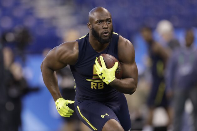 LSU running back Leonard Fournette runs a drill at the NFL football scouting combine Friday, March 3, 2017, in Indianapolis. (AP Photo/David J. Phillip)