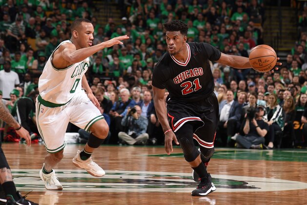 BOSTON, MA - APRIL 18:  Jimmy Butler #21 of the Chicago Bulls handles the ball against Avery Bradley #0 of the Boston Celtics during Game Two of the Eastern Conference Quarterfinals of the 2017 NBA Playoffs on April 18, 2017 at TD Garden in Boston, MA. NOTE TO USER: User expressly acknowledges and agrees that, by downloading and or using this Photograph, user is consenting to the terms and conditions of the Getty Images License Agreement. Mandatory Copyright Notice: Copyright 2017 NBAE (Photo by Brian Babineau/NBAE via Getty Images)