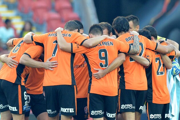 BRISBANE, AUSTRALIA - APRIL 16:  Roar players embrace before the round 27 A-League match between the Brisbane Roar and the Wellington Phoenix at Suncorp Stadium on April 16, 2017 in Brisbane, Australia.  (Photo by Bradley Kanaris/Getty Images)