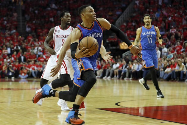 HOUSTON, TX - APRIL 19:  Russell Westbrook #0 of the Oklahoma City Thunder drives to the basket defended by Eric Gordon #10 of the Houston Rockets in the second half of Game Two of the Western Conference quarterfinals game during the 2017 NBA Playoffs at Toyota Center on April 19, 2017 in Houston, Texas. NOTE TO USER: User expressly acknowledges and agrees that, by downloading and or using this photograph, User is consenting to the terms and conditions of the Getty Images License Agreement.  (Photo by Tim Warner/Getty Images)