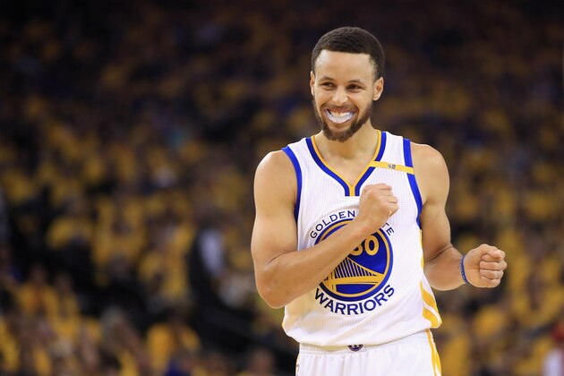 OAKLAND, CA - APRIL 19:  Stephen Curry #30 of the Golden State Warriors smiles during their game against the Portland Trail Blazers in Game Two of the Western Conference Quarterfinals during the 2017 NBA Playoffs at ORACLE Arena on April 19, 2017 in Oakland, California. NOTE TO USER: User expressly acknowledges and agrees that, by downloading and or using this photograph, User is consenting to the terms and conditions of the Getty Images License Agreement.  (Photo by Ezra Shaw/Getty Images)