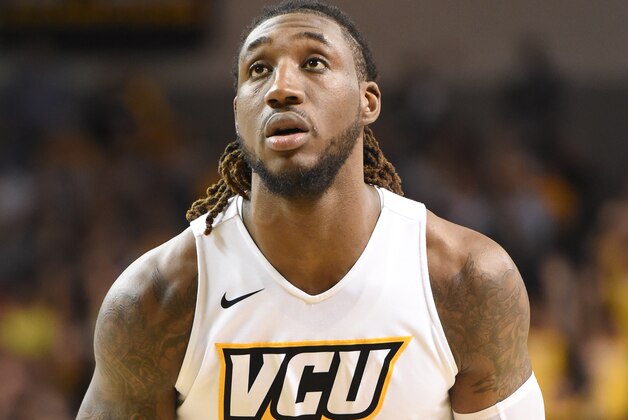RICHMOND, VA - JANUARY 11:  Mo Alie-Cox #12 of the Virginia Commonwealth Rams takes a foul shot during a college basketball game against the George Washington Colonials at the Siegel Center on January 11, 2017 in Richmond, Virginia.  The Rams won 85-55.  (Photo by Mitchell Layton/Getty Images)