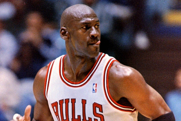 Chicago Bulls guard Michael Jordan (23) hustles downcourt on defense during an exhibition game against the Philadelphia 76ers on Friday, Oct. 24, 1997, at the Dean Smith Center in Chapel Hill, N.C. Jordan finished with 18 points and five assists in 24 minutes as the Bulls defeated the Sixers 113-101. (AP Photo/Karl DeBlaker)