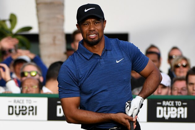 DUBAI, UNITED ARAB EMIRATES - FEBRUARY 02:  Tiger Woods o f the USA watches his tee shot on the 1st tee during the first round of the Omega Dubai Desert Classic at Emirates Golf Club on February 2, 2017 in Dubai, United Arab Emirates.  (Photo by Ross Kinnaird/Getty Images)