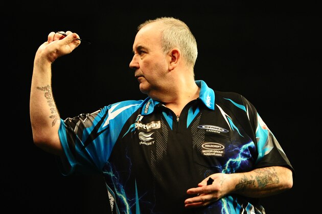 EXETER, UNITED KINGDOM - MARCH 02: Phil Taylor throws during Night Five of the Betway Premier League Darts at Westpoint Arena on March 2, 2017 in Exeter, England. (Photo by Harry Trump/Getty Images)