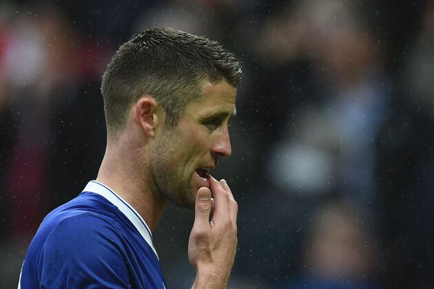 Chelsea's English defender Gary Cahill leaves the pitch at the English Premier League football match between Manchester United and Chelsea at Old Trafford in Manchester, north west England, on April 16, 2017. / AFP PHOTO / Oli SCARFF / RESTRICTED TO EDITORIAL USE. No use with unauthorized audio, video, data, fixture lists, club/league logos or 'live' services. Online in-match use limited to 75 images, no video emulation. No use in betting, games or single club/league/player publications.  /         (Photo credit should read OLI SCARFF/AFP/Getty Images)