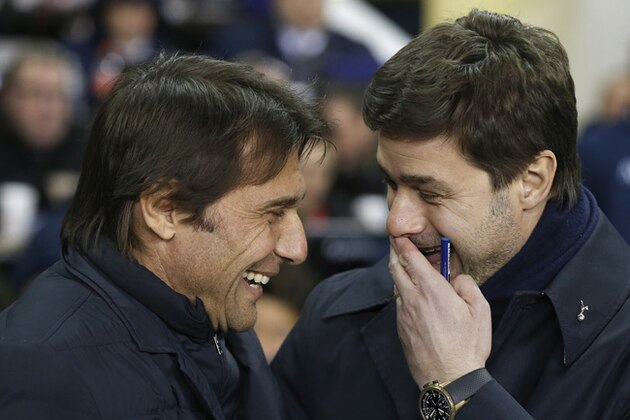 Chelsea's manager Antonio Conte, left, and Tottenham's manager Mauricio Pochettino smile together ahead of the English Premier League soccer match between Tottenham Hotspur and Chelsea at White Hart Lane stadium in London, Wednesday, Jan. 4, 2017. (AP Photo/Alastair Grant)