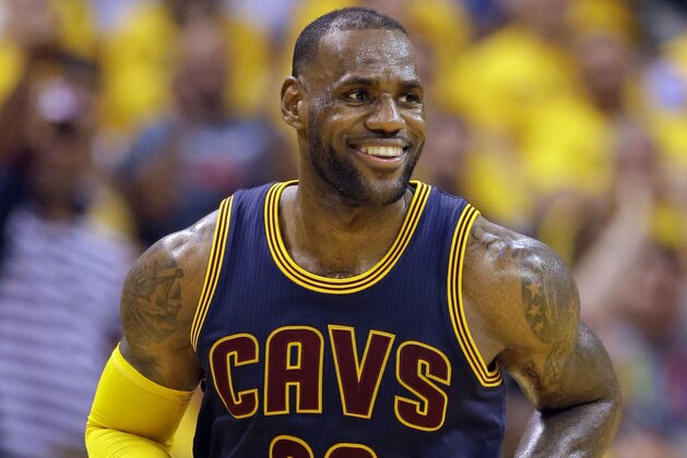Cleveland Cavaliers forward LeBron James smiles after hitting a basket against the Indiana Pacers during the second half of Game 3 of a first-round NBA basketball playoff series, Thursday, April 20, 2017, in Indianapolis. The Cavaliers defeated the Pacers 119-114. (AP Photo/Michael Conroy)