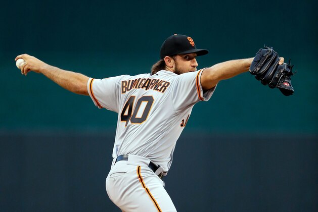 KANSAS CITY, MO - APRIL 19:  Starting pitcher Madison Bumgarner #40 of the San Francisco Giants warms up prior to the game against the Kansas City Royals at Kauffman Stadium on April 19, 2017 in Kansas City, Missouri.  (Photo by Jamie Squire/Getty Images)