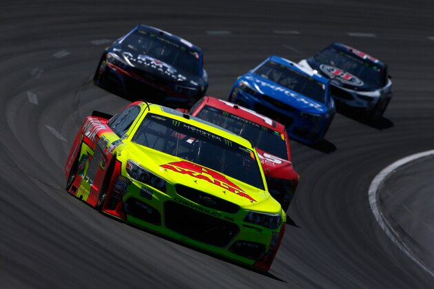 FORT WORTH, TX - APRIL 09:  Dale Earnhardt Jr., driver of the #88 Axalta Chevrolet, leads a pack of cars during the Monster Energy NASCAR Cup Series O'Reilly Auto Parts 500 at Texas Motor Speedway on April 9, 2017 in Fort Worth, Texas.  (Photo by Sean Gardner/Getty Images)