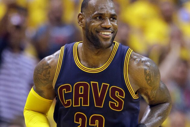 Cleveland Cavaliers forward LeBron James smiles after hitting a basket against the Indiana Pacers during the second half of Game 3 of a first-round NBA basketball playoff series, Thursday, April 20, 2017, in Indianapolis. The Cavaliers defeated the Pacers 119-114. (AP Photo/Michael Conroy)