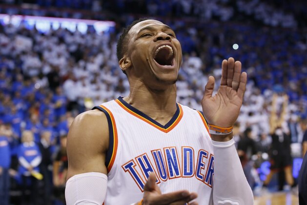 Oklahoma City Thunder guard Russell Westbrook shouts to fans before a first-round NBA basketball playoff game against the Houston Rockets in Oklahoma City, Friday, April 21, 2017. (AP Photo/Sue Ogrocki)