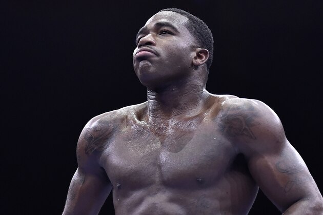 FILE - In this June 20, 2015, file photo, Adrien Broner walks back to his corner during his welterweight boxing bout against Shawn Porter in Las Vegas. Broner was sentenced to 30 days in jail for failing to show up for his scheduled trial on assault and robbery charges. A court official confirmed Wednesday, July 20, 2016, that a Hamilton County judge in Cincinnati sentenced the former WBA Super Lightweight champion Tuesday after finding him in contempt of court. Broner showed up later Tuesday, telling the judge he had been sick. The judge said that wasn't an excuse. (AP Photo/David Becker, File)