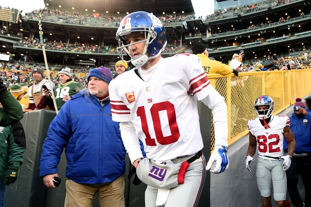 GREEN BAY, WI - JANUARY 8: Eli Manning #10 of the New York Giants takes the field before the NFC Wild Card game against the Green Bay Packers at Lambeau Field on January 8, 2017 in Green Bay, Wisconsin. (Photo by Stacy Revere/Getty Images)