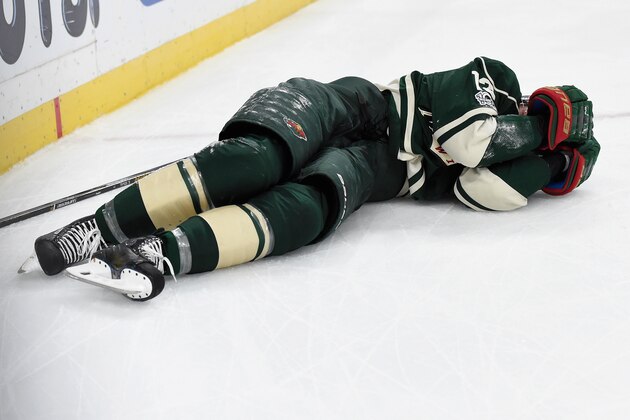 ST PAUL, MN - APRIL 22: Eric Staal #12 of the Minnesota Wild lays on the ice after hitting the boards against the St. Louis Blues during the second period in Game Five of the Western Conference First Round during the 2017 NHL Stanley Cup Playoffs at Xcel Energy Center on April 14, 2017 in St Paul, Minnesota. (Photo by Hannah Foslien/Getty Images)