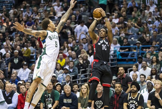 Apr 22, 2017; Milwaukee, WI, USA; Toronto Raptors guard DeMar DeRozan (10) shoots against Milwaukee Bucks forward Michael Beasley (9) during the second quarter in game four of the first round of the 2017 NBA Playoffs at BMO Harris Bradley Center. Mandatory Credit: Jeff Hanisch-USA TODAY Sports