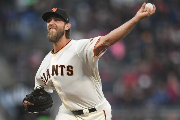 SAN FRANCISCO, CA - APRIL 13:  Madison Bumgarner #40 of the San Francisco Giants pitches against the Colorado Rockies in the top of the first inning at AT&T Park on April 13, 2017 in San Francisco, California.  (Photo by Thearon W. Henderson/Getty Images)