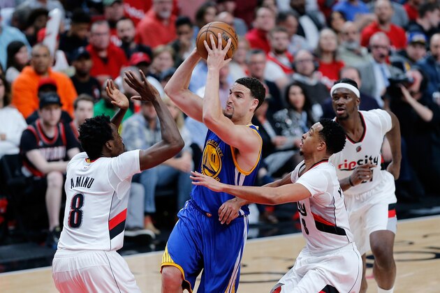 PORTLAND, OR - APRIL 22:  Klay Thompson #11 of the Golden State Warriors shoots the ball over Al Farouq Aminu #8 of the Portland Trail Blazers during Game Three of the Western Conference Quarterfinals of  the 2017 NBA Playoffs at Moda Center on April 22, 2017 in Portland, Oregon.  NOTE TO USER: User expressly acknowledges and agrees that, by downloading and or using this photograph, User is consenting to the terms and conditions of the Getty Images License Agreement.  (Photo by Jonathan Ferrey/Getty Images)