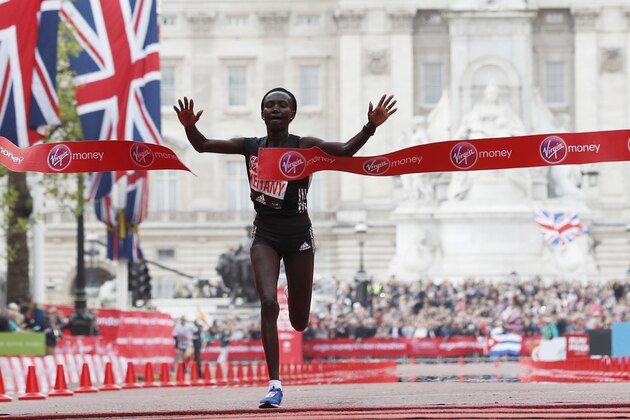 Kenya's Mary Keitany wins the women's elite race at the London marathon on April 23, 2017 in London.
Kenya's Mary Keitany won a third London Marathon today posting an unofficial time of 2hrs 17min 01sec -- the fastest time in a women-only marathon. / AFP PHOTO / Adrian DENNIS        (Photo credit should read ADRIAN DENNIS/AFP/Getty Images)
