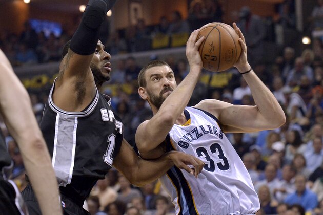Memphis Grizzlies center Marc Gasol (33) drives against San Antonio Spurs forward LaMarcus Aldridge, left, during the first half of Game 4 in an NBA basketball first-round playoff series Saturday, April 22, 2017, in Memphis, Tenn. (AP Photo/Brandon Dill)