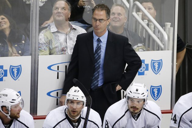 Los Angeles Kings assistant coach John Stevens stands behind his bench during the first period of an NHL hockey game against the Pittsburgh Penguins in Pittsburgh, Thursday, Oct. 30, 2014. The Penguins won 3-0. (AP Photo/Gene J. Puskar)