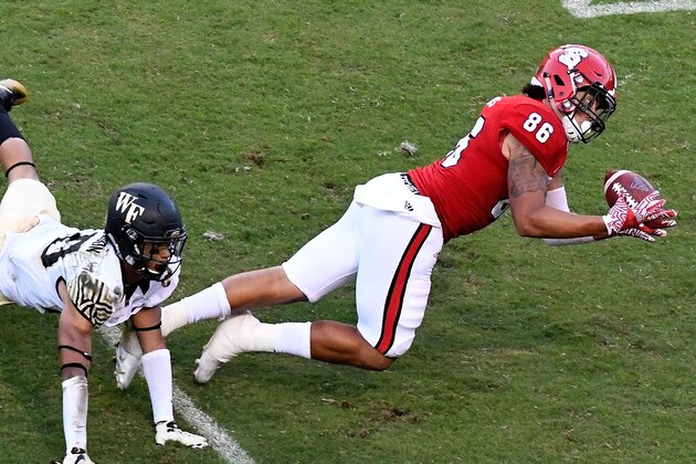 RALEIGH, NC - OCTOBER 01:  Thaddeus Moss #86 of the NC State Wolfpack makes a diving reception against the Wake Forest Demon Deacons at Carter-Finley Stadium on October 1, 2016 in Raleigh, North Carolina. (Photo by Mike Comer/Getty Images)