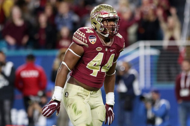 MIAMI GARDENS, FL - DECEMBER 30:  DeMarcus Walker #44 of the Florida State Seminoles reacts in the first half against the Michigan Wolverines during the Capitol One Orange Bowl at Sun Life Stadium on December 30, 2016 in Miami Gardens, Florida.  (Photo by Marc Serota/Getty Images)
